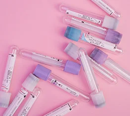 Vials of biological material to be transported, representing temperature‑sensitive healthcare shipments requiring controlled transport.